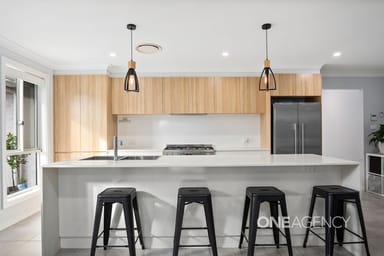 Property 10 Wildflower Crescent, CALDERWOOD NSW 2527 IMAGE 0