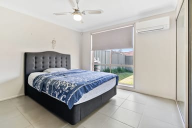 Property 2, 38 Fuchsia Crescent, Macquarie Fields NSW 2564 IMAGE 0