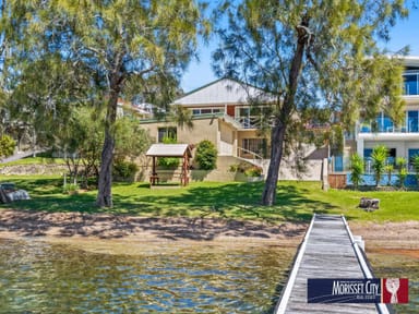 Property 11 Beach Road, BALCOLYN NSW 2264 IMAGE 0