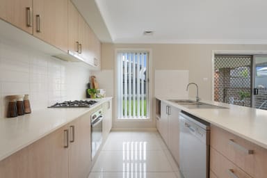 Property 8A Foxtail Drive, DENHAM COURT NSW 2565 IMAGE 0