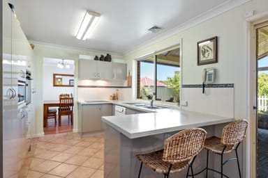 Property 12 ROBINIA GROVE, GARDEN SUBURB NSW 2289 IMAGE 0