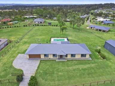 Property 15 Walton Place, Woodhill QLD 4285 IMAGE 0