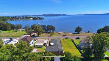 Property 18 Peace Parade, TANILBA BAY NSW 2319 IMAGE 0